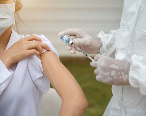 Nurse giving a vaccine